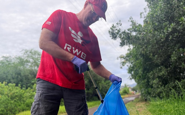 Laulima Navy volunteers unite to clean the Pearl Harbor Bike Path in Aiea.