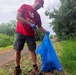 Laulima Navy volunteers unite to clean the Pearl Harbor Bike Path in Aiea.