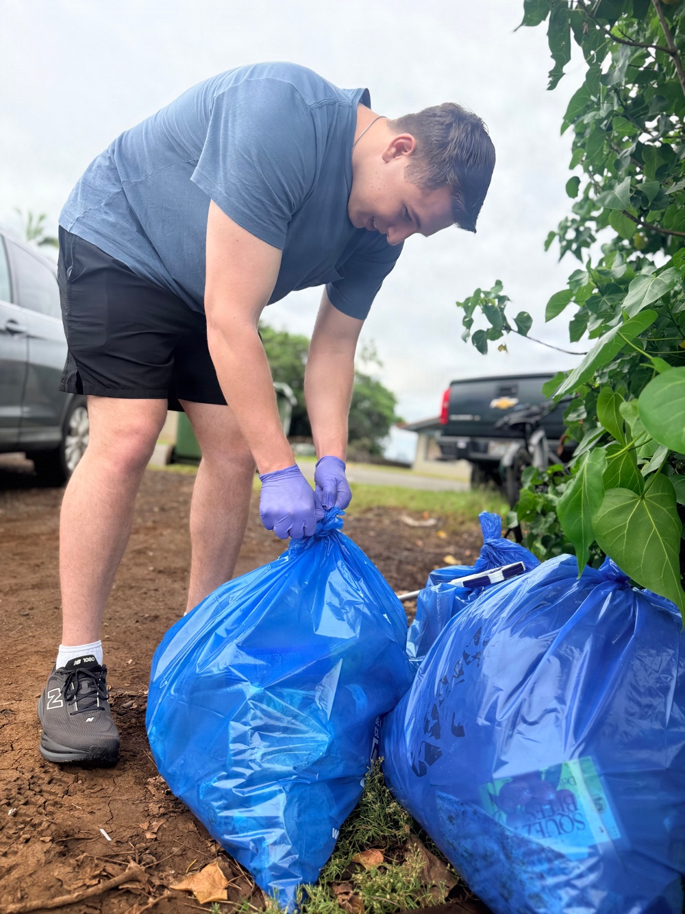 Laulima Navy volunteers unite to clean the Pearl Harbor Bike Path in Aiea.