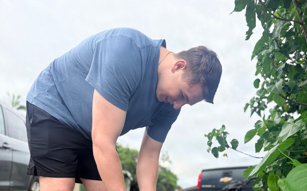 Laulima Navy volunteers unite to clean the Pearl Harbor Bike Path in Aiea.