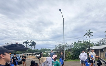 Laulima Navy volunteers unite to clean the Pearl Harbor Bike Path in Aiea.
