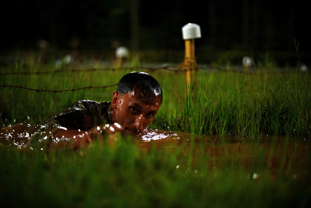 Best Ranger Competitor Crawls Through Mud