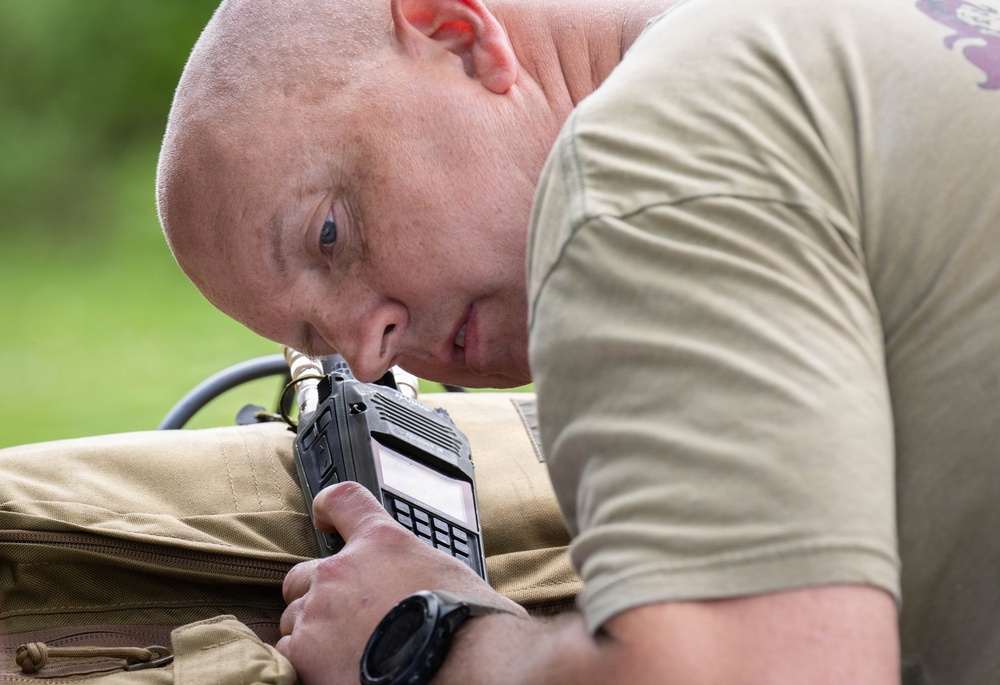Airmen from the 113th Contingency Response Squadron practice land navigation at Camp Atterbury Joint Maneuver Training Center