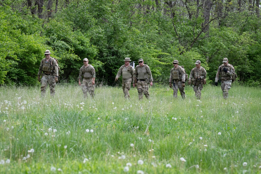 Airmen from the 113th Contingency Response Squadron practice land navigation at Camp Atterbury Joint Maneuver Training Center