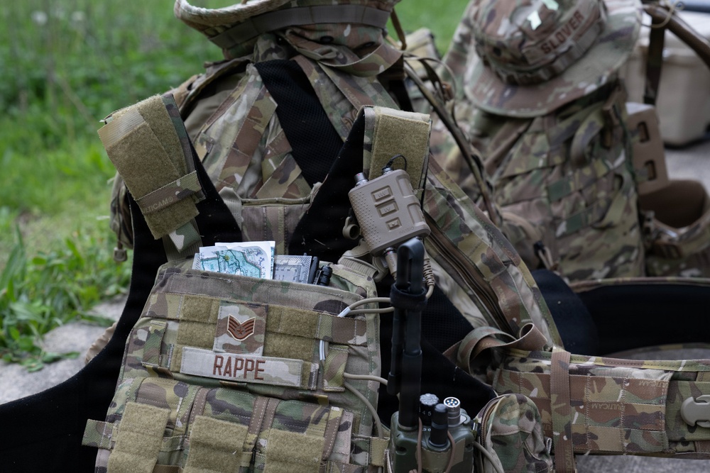 Airmen from the 113th Contingency Response Squadron practice land navigation at Camp Atterbury Joint Maneuver Training Center
