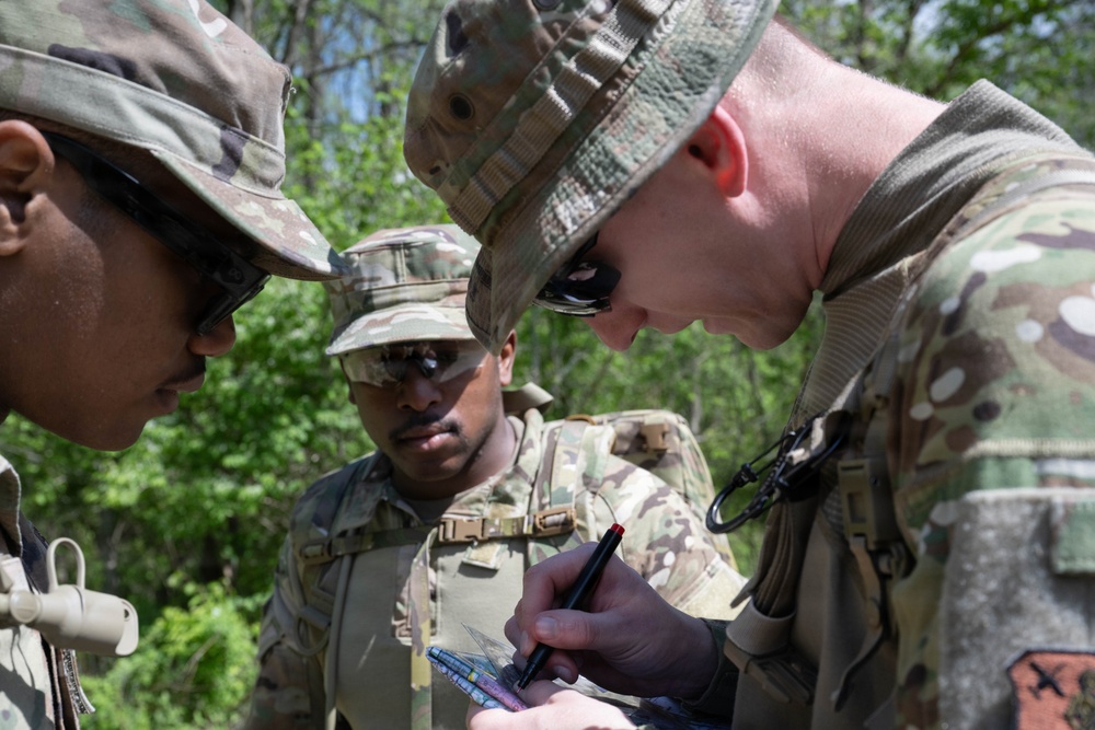 Airmen from the 113th Contingency Response Squadron practice land navigation at Camp Atterbury Joint Maneuver Training Center