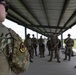 Airmen from the 113th Contingency Response Squadron fire M18 Sig Sauer handguns and transition with M4A1 carbine rifles at Camp Atterbury