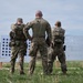 Airmen from the 113th Contingency Response Squadron fire M18 Sig Sauer handguns and transition with M4A1 carbine rifles at Camp Atterbury