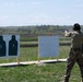 Airmen from the 113th Contingency Response Squadron fire M18 Sig Sauer handguns and transition with M4A1 carbine rifles at Camp Atterbury
