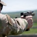 Airmen from the 113th Contingency Response Squadron fire M18 Sig Sauer handguns and transition with M4A1 carbine rifles at Camp Atterbury