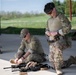 Airmen from the 113th Contingency Response Squadron fire M18 Sig Sauer handguns and transition with M4A1 carbine rifles at Camp Atterbury