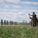 Airmen from the 113th Contingency Response Squadron fire M18 Sig Sauer handguns and transition with M4A1 carbine rifles at Camp Atterbury