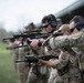 Airmen from the 113th Contingency Response Squadron fire M18 Sig Sauer handguns and transition with M4A1 carbine rifles at Camp Atterbury