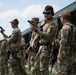 Airmen from the 113th Contingency Response Squadron fire M18 Sig Sauer handguns and transition with M4A1 carbine rifles at Camp Atterbury