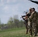 Airmen from the 113th Contingency Response Squadron fire M18 Sig Sauer handguns and transition with M4A1 carbine rifles at Camp Atterbury