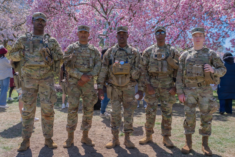 Soldiers from the Mississippi National Guard patrol during the Cherry Blossom Festival