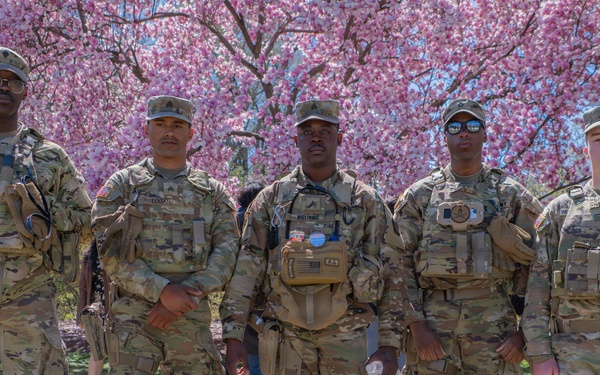 Soldiers from the Mississippi National Guard patrol during the Cherry Blossom Festival