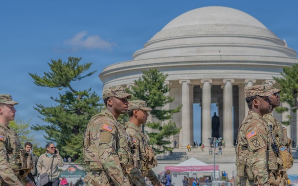 Soldiers from the Mississippi National Guard patrol during the Cherry Blossom Festival