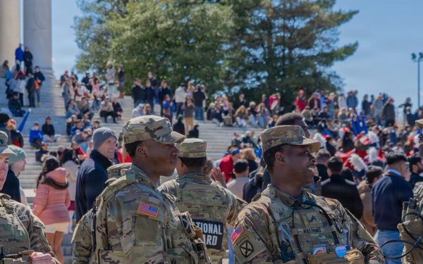 Soldiers from the Mississippi National Guard patrol during the Cherry Blossom Festival
