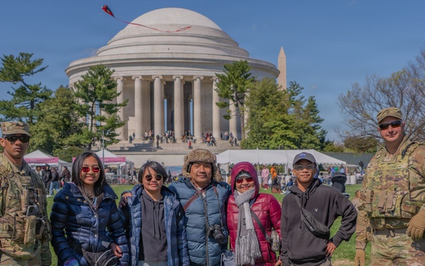 Soldiers from the Mississippi National Guard patrol during the Cherry Blossom Festival