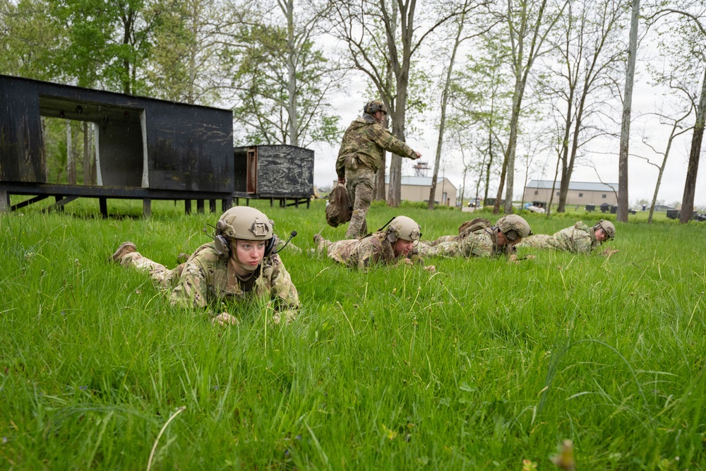Airmen from the 113th Contingency Response Squadron and 181st Medical Group participate in Round-robin helicopter training on a UH-60 Black Hawk at Camp Atterbury