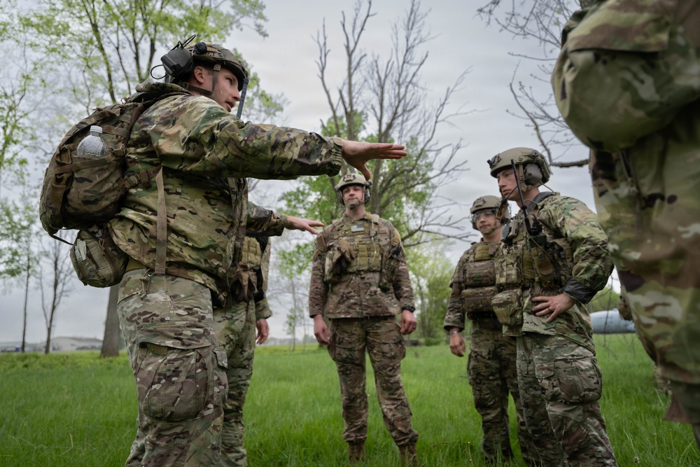 Airmen from the 113th Contingency Response Squadron and 181st Medical Group participate in Round-robin helicopter training on a UH-60 Black Hawk at Camp Atterbury