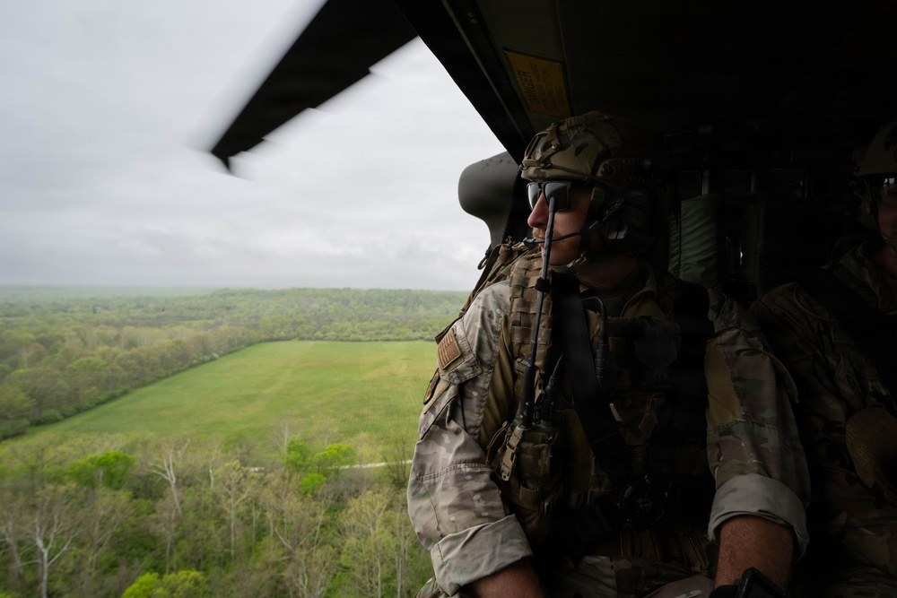 Airmen from the 113th Contingency Response Squadron and 181st Medical Group participate in Round-robin helicopter training on a UH-60 Black Hawk at Camp Atterbury