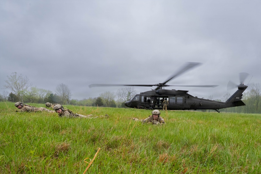 Airmen from the 113th Contingency Response Squadron and 181st Medical Group participate in Round-robin helicopter training on a UH-60 Black Hawk at Camp Atterbury