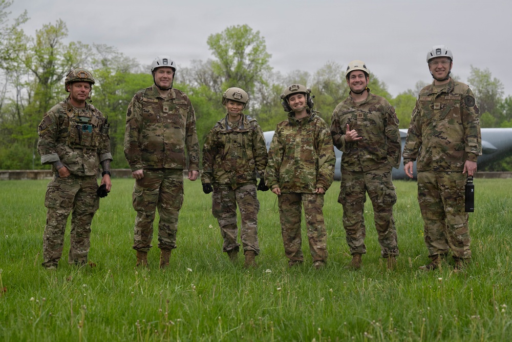 Airmen from the 113th Contingency Response Squadron and 181st Medical Group participate in Round-robin helicopter training on a UH-60 Black Hawk at Camp Atterbury