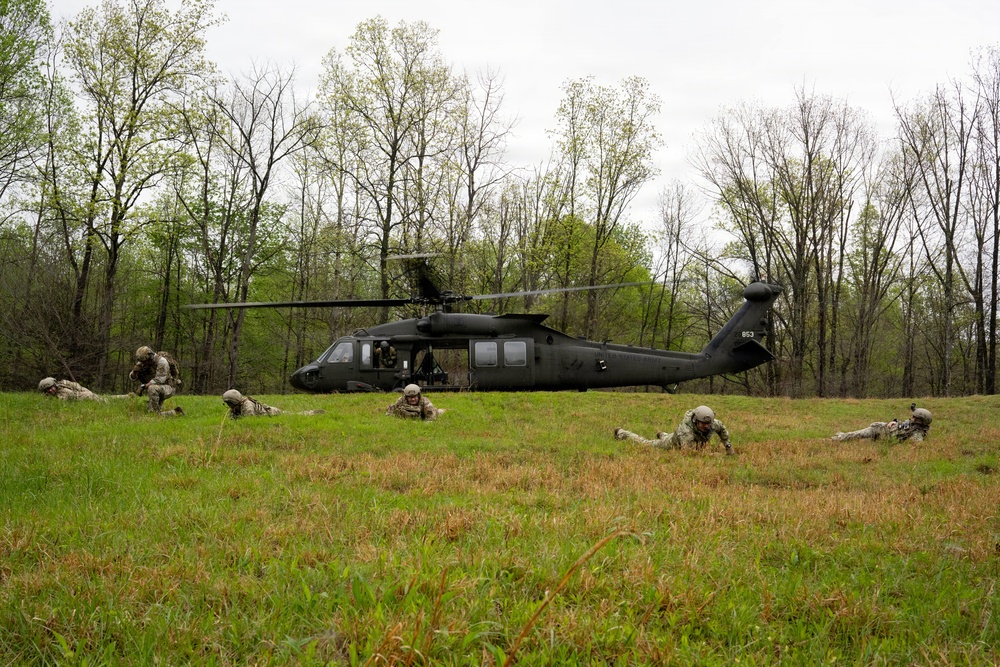Airmen from the 113th Contingency Response Squadron and 181st Medical Group participate in Round-robin helicopter training on a UH-60 Black Hawk at Camp Atterbury