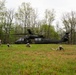 Airmen from the 113th Contingency Response Squadron and 181st Medical Group participate in Round-robin helicopter training on a UH-60 Black Hawk at Camp Atterbury