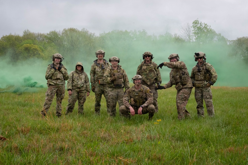 Airmen from the 113th Contingency Response Squadron and 181st Medical Group participate in Round-robin helicopter training on a UH-60 Black Hawk at Camp Atterbury