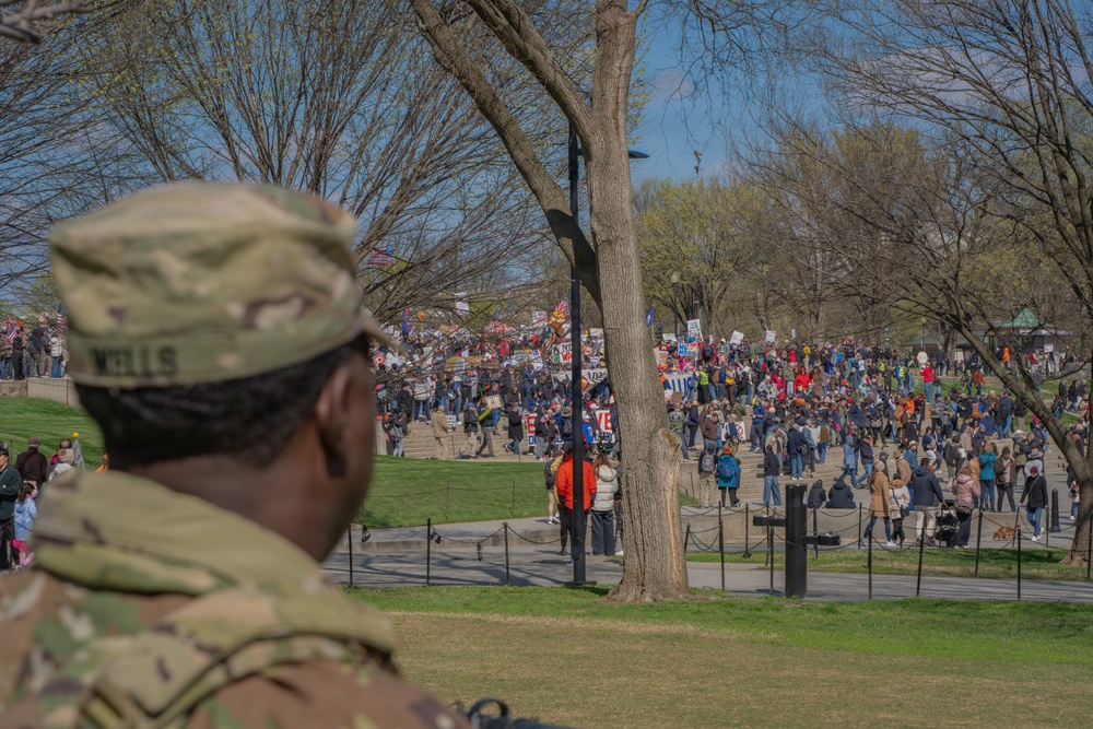 Mississippi National Guard Soldiers patrol during a protest at the Lincoln Memorial