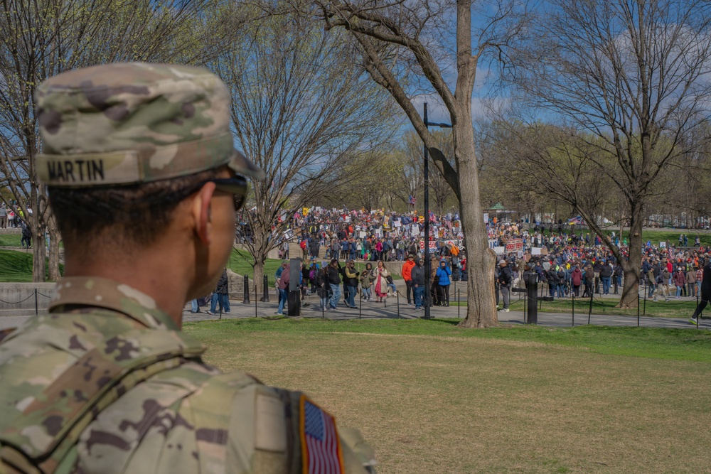 Mississippi National Guard Soldiers patrol during a protest at the Lincoln Memorial