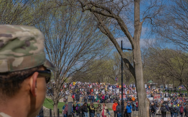 Mississippi National Guard Soldiers patrol during a protest at the Lincoln Memorial