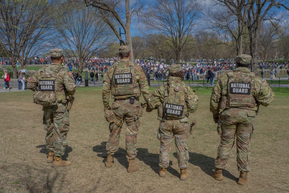 Mississippi National Guard Soldiers patrol during a protest at the Lincoln Memorial