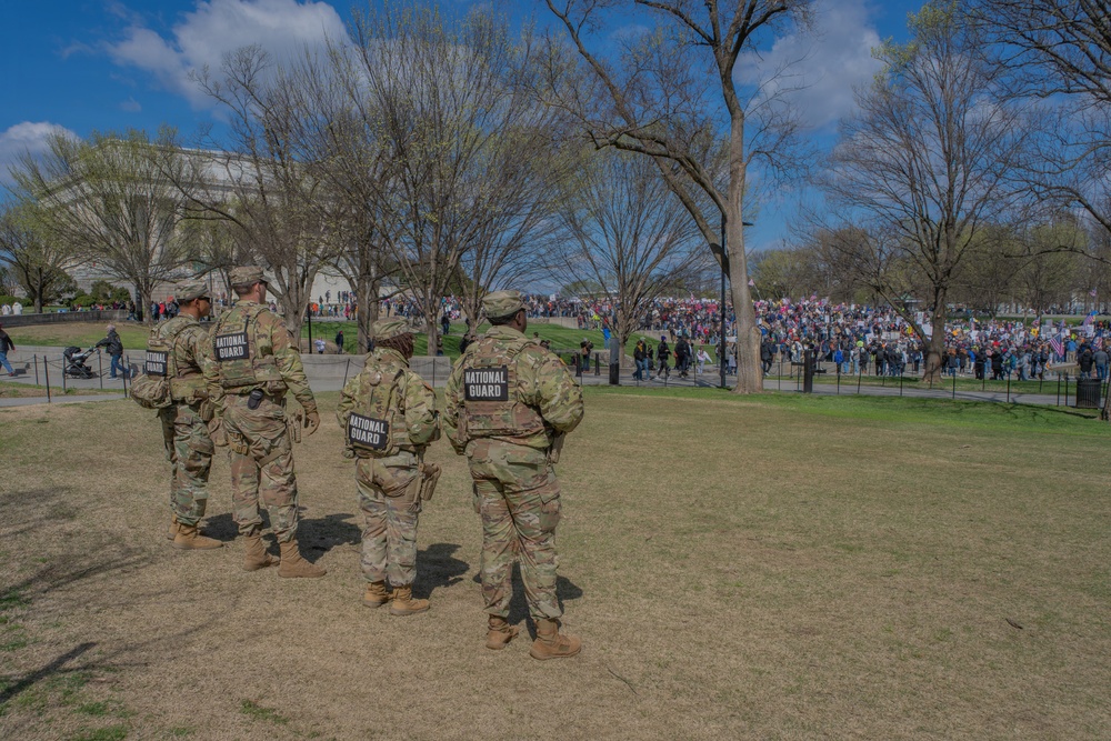Mississippi National Guard Soldiers patrol during a protest at the Lincoln Memorial