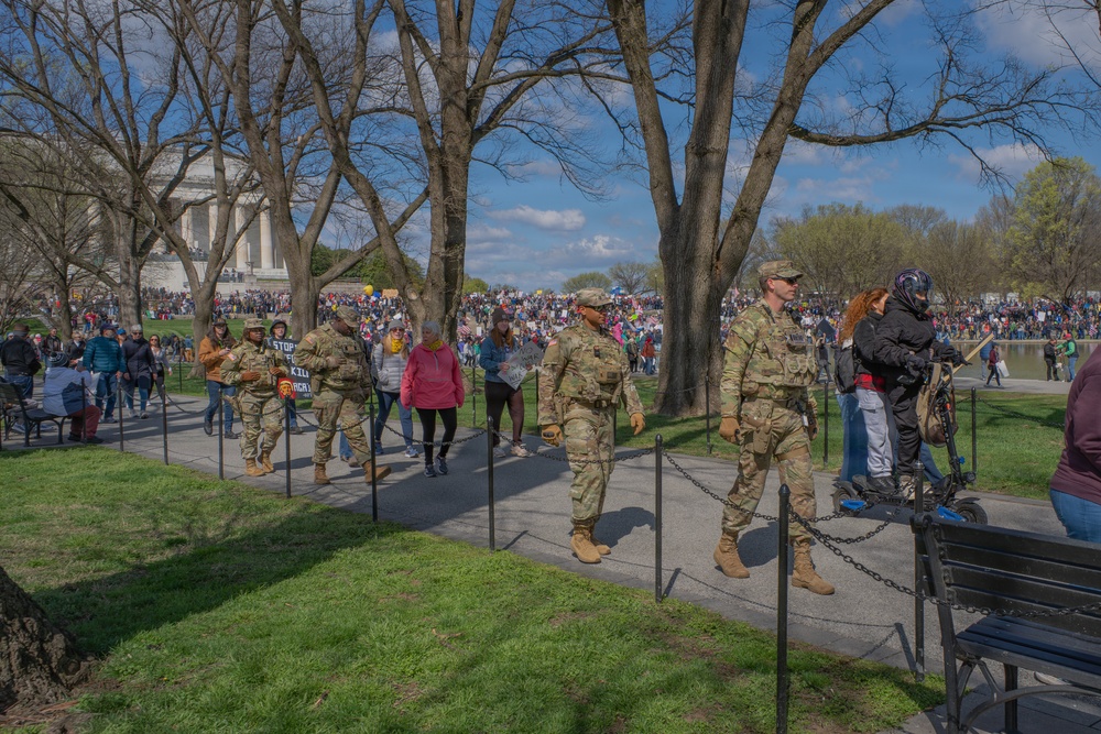 Mississippi National Guard Soldiers patrol during a protest at the Lincoln Memorial