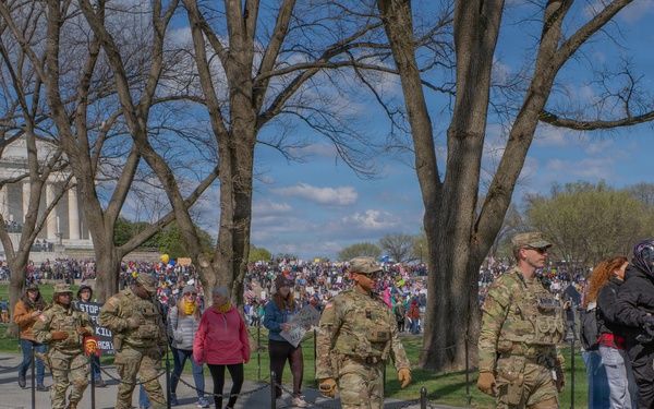 Mississippi National Guard Soldiers patrol during a protest at the Lincoln Memorial