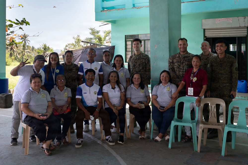 Balikatan 2026: U.S. service members hand out mosquito nets as part of a cooperative health engagement in Casiguran