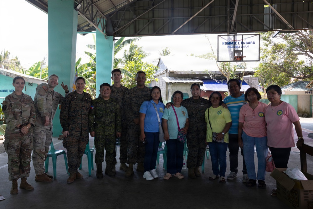 Balikatan 2026: U.S. service members hand out mosquito nets as part of a cooperative health engagement in Casiguran