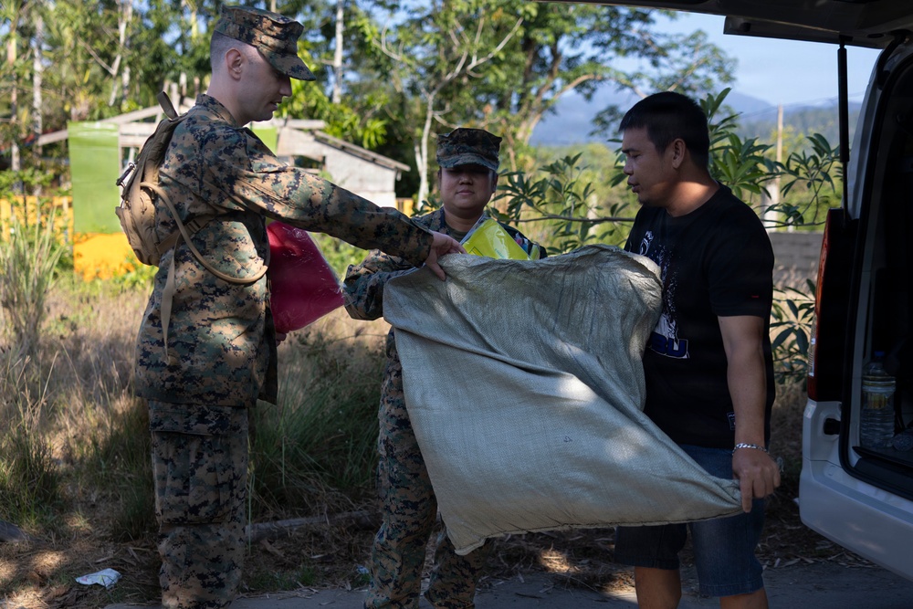 Balikatan 2026: U.S. service members hand out mosquito nets as part of a cooperative health engagement in Casiguran