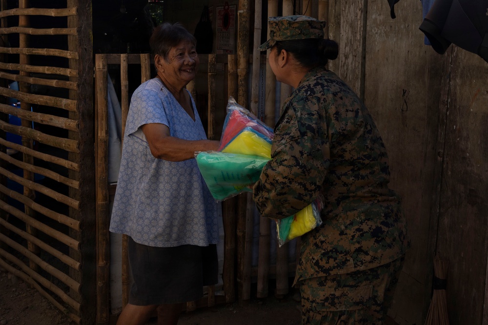 Balikatan 2026: U.S. service members hand out mosquito nets as part of a cooperative health engagement in Casiguran