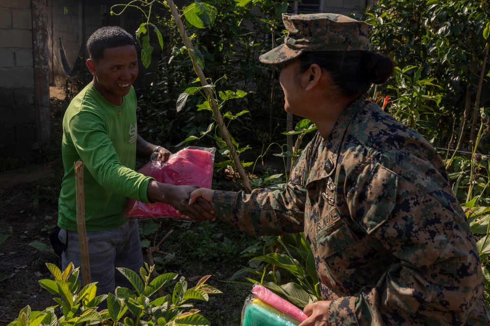 Balikatan 2026: U.S. service members hand out mosquito nets as part of a cooperative health engagement in Casiguran