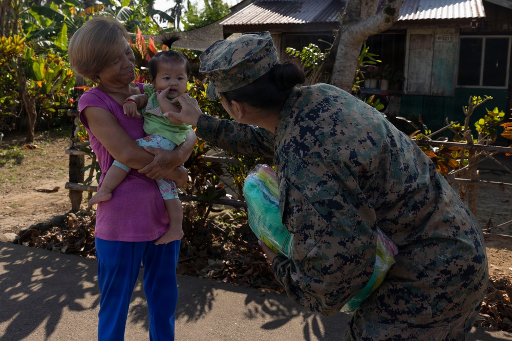 Balikatan 2026: U.S. service members hand out mosquito nets as part of a cooperative health engagement in Casiguran