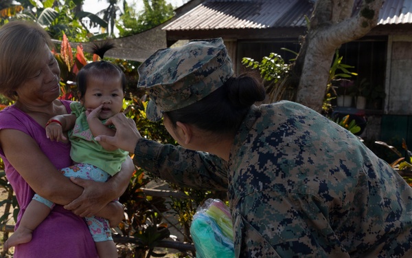 Balikatan 2026: U.S. service members hand out mosquito nets as part of a cooperative health engagement in Casiguran