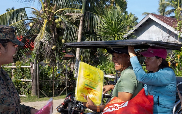 Balikatan 2026: U.S. service members hand out mosquito nets as part of a cooperative health engagement in Casiguran