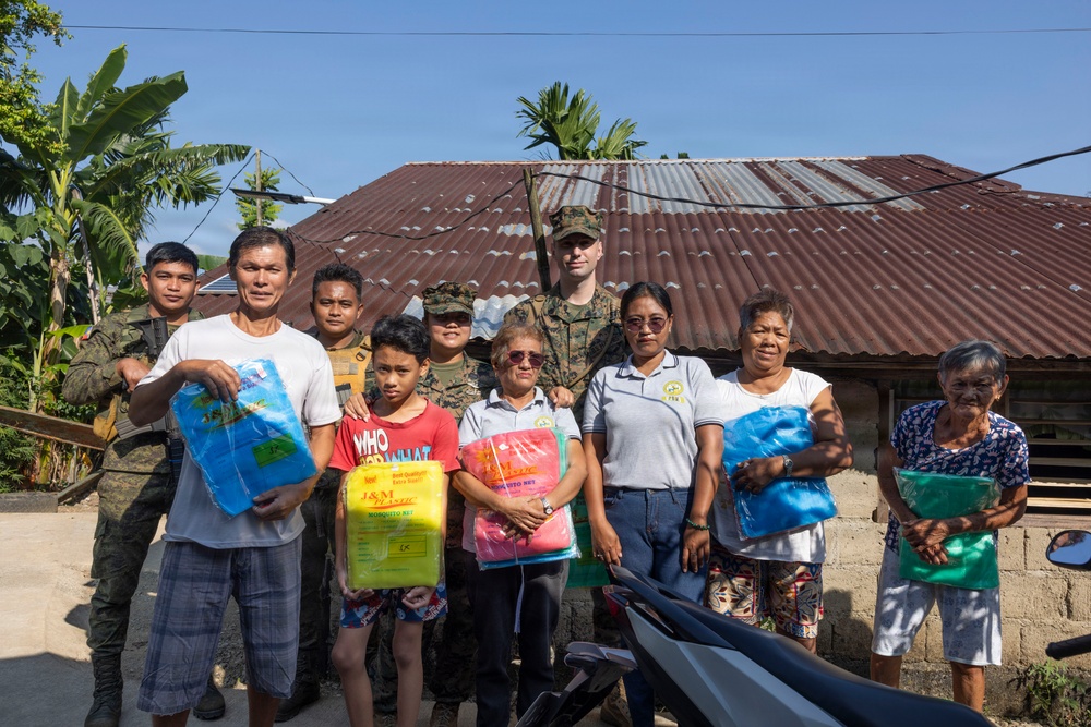 Balikatan 2026: U.S. service members hand out mosquito nets as part of a cooperative health engagement in Casiguran