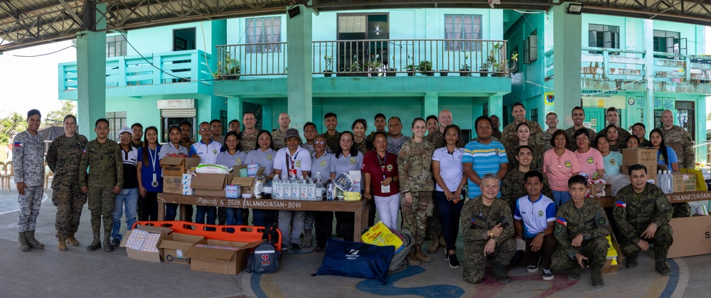 Balikatan 2026: U.S. service members hand out mosquito nets as part of a cooperative health engagement in Casiguran