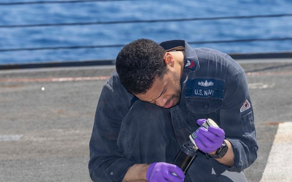 Gunner's Mate performs maintenance on USS Bulkeley (DDG 84), April 10, 2026